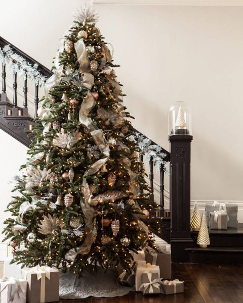BH Noble Fir decorated in front of a stairwell
