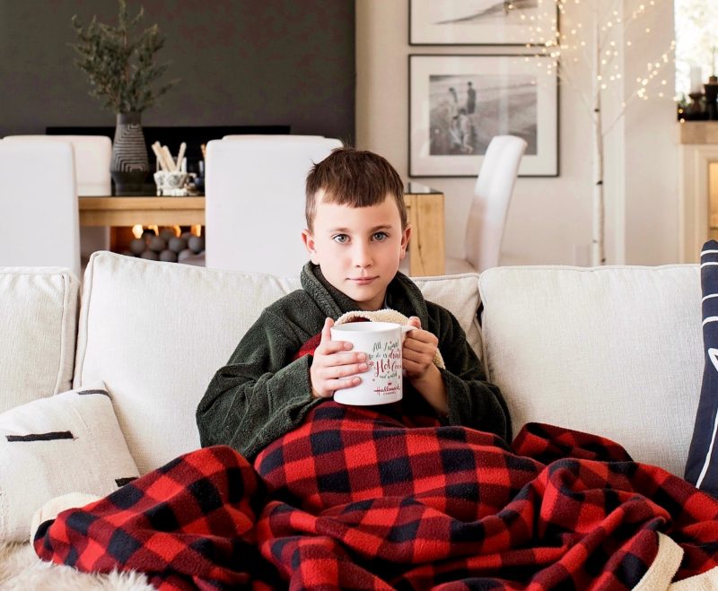 Aedriel serves hot cocoa during a movie night featuring Hallmark Channel original movies