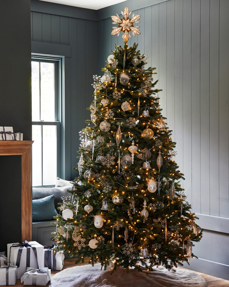 winter white ornaments on pre-lit Christmas tree