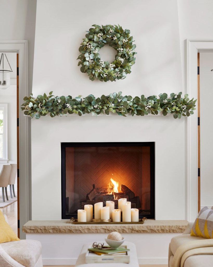 Wreath, garland, and candle décor for mantels