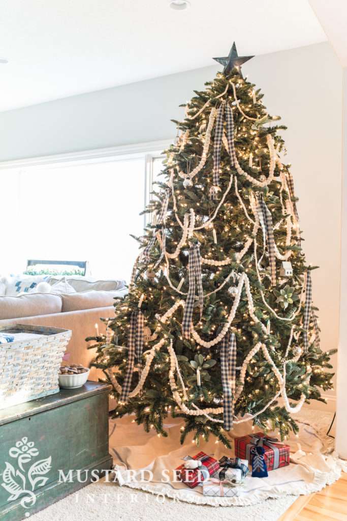 Artificial Christmas tree decorated with traditional country theme