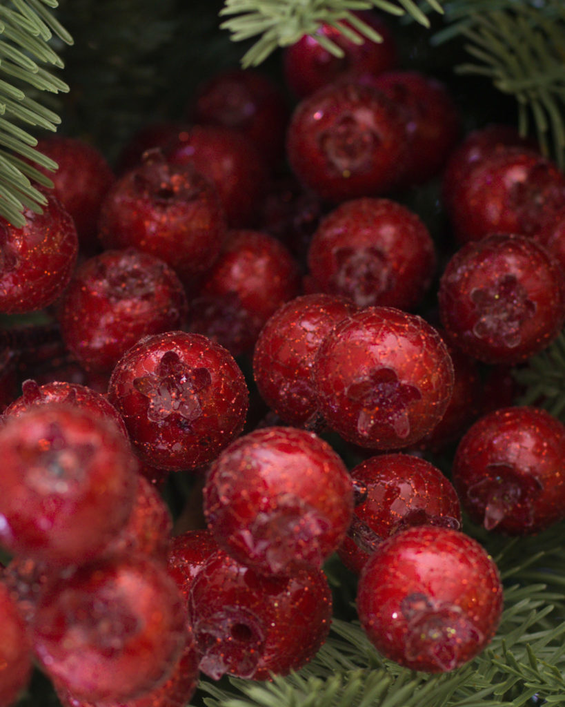 close up of balsam hill red berry tree picks