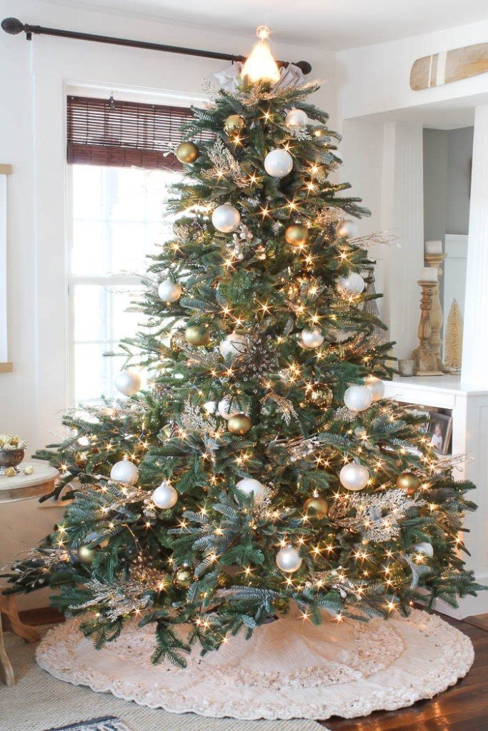 full shot of pre-lit artificial christmas tree