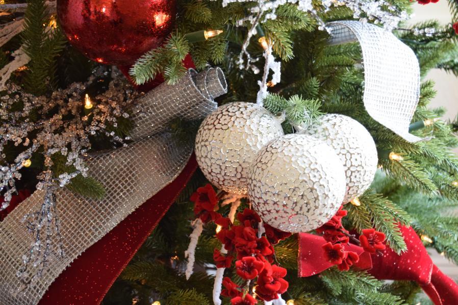 red, white, and silver ornaments, ribbons, and picks