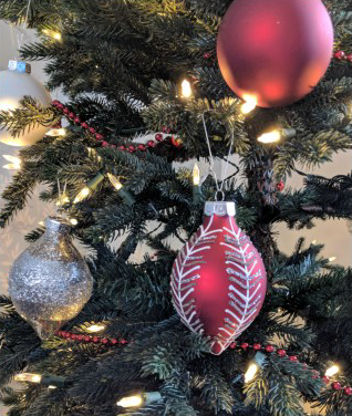 Red and white ornaments on tree