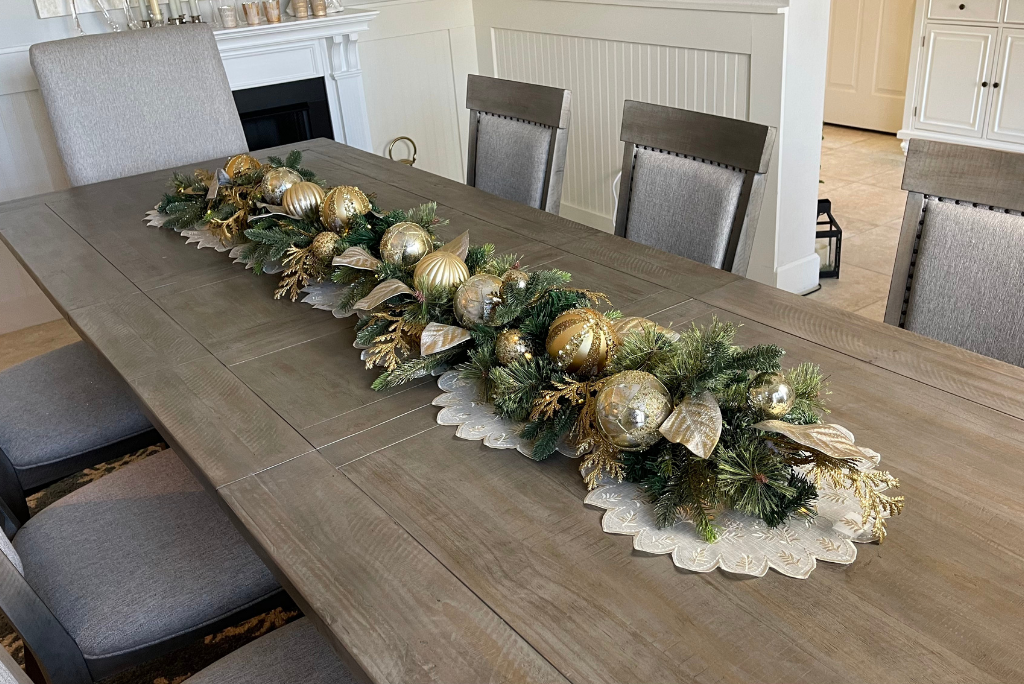 Balsam Hill Biltmore gold garland as a Christmas centerpiece for the dining table