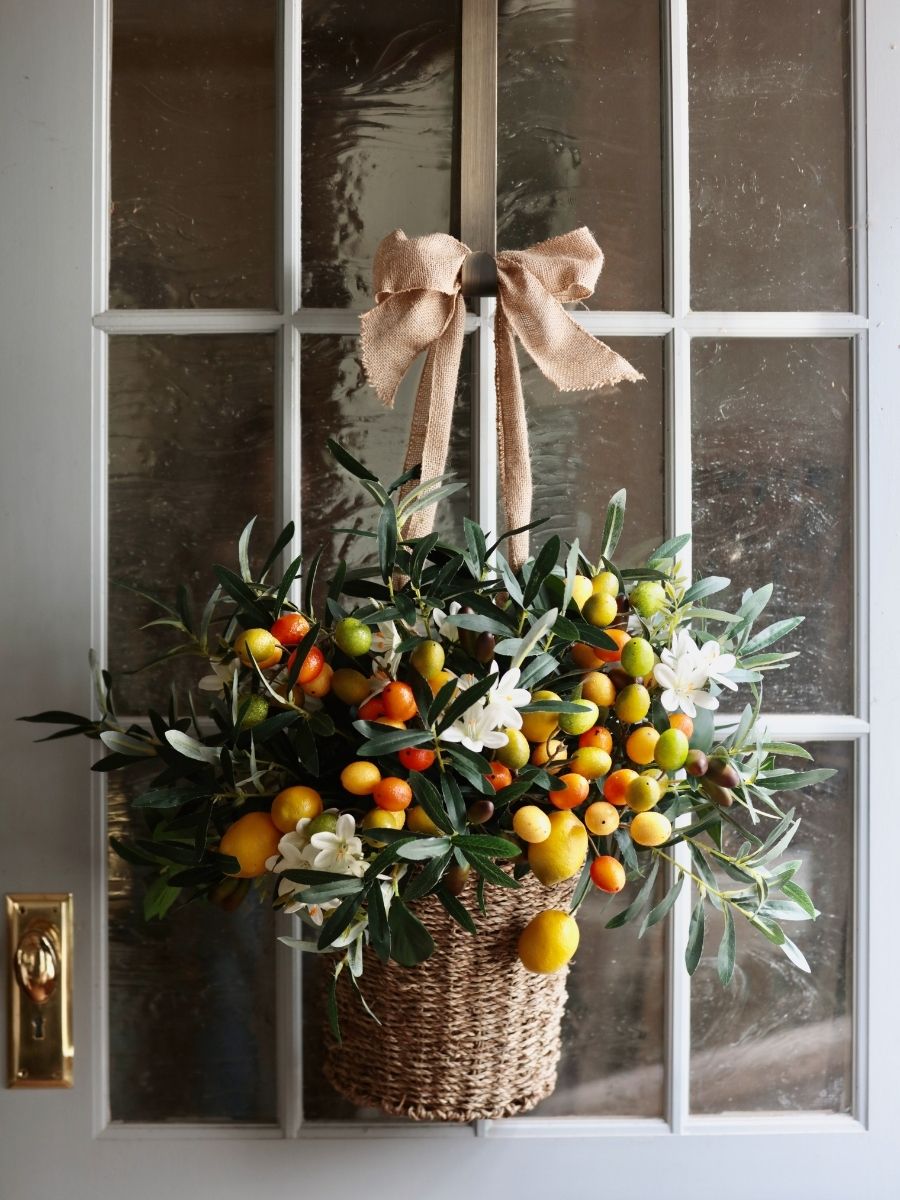 Tuscan-inspired foliage in a hanging basket as spring home decoration