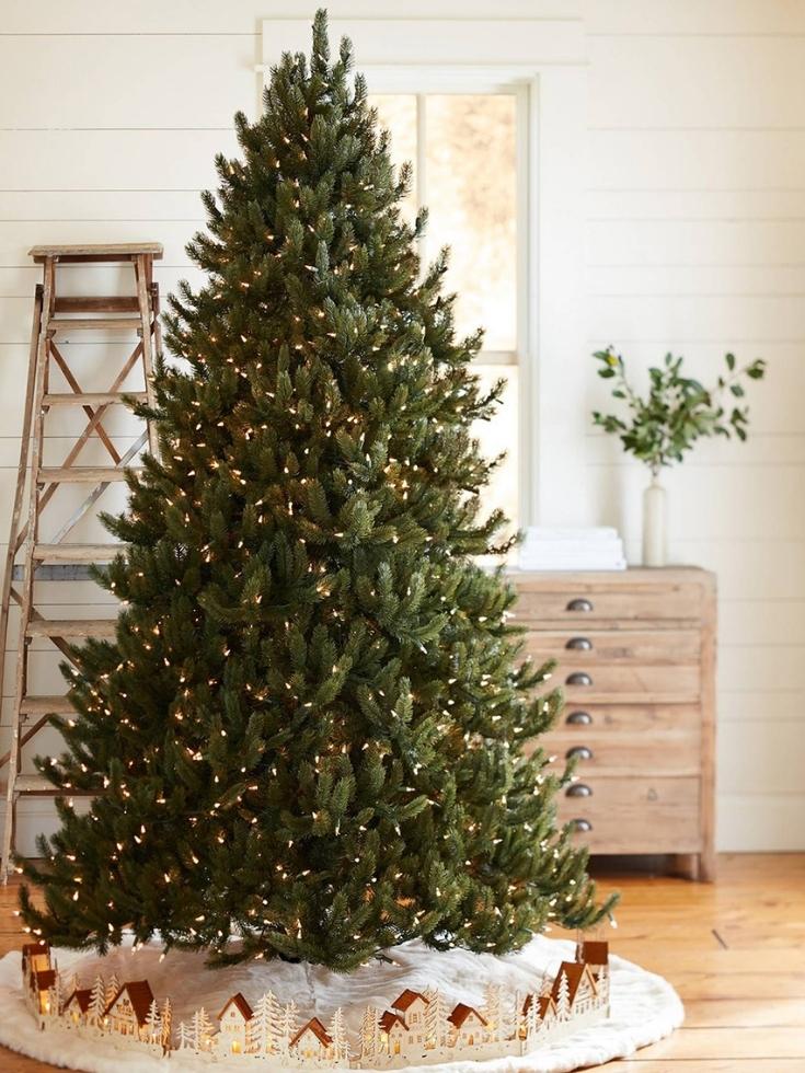 A Vermont White Spruce Balsam Hill tree in a living room