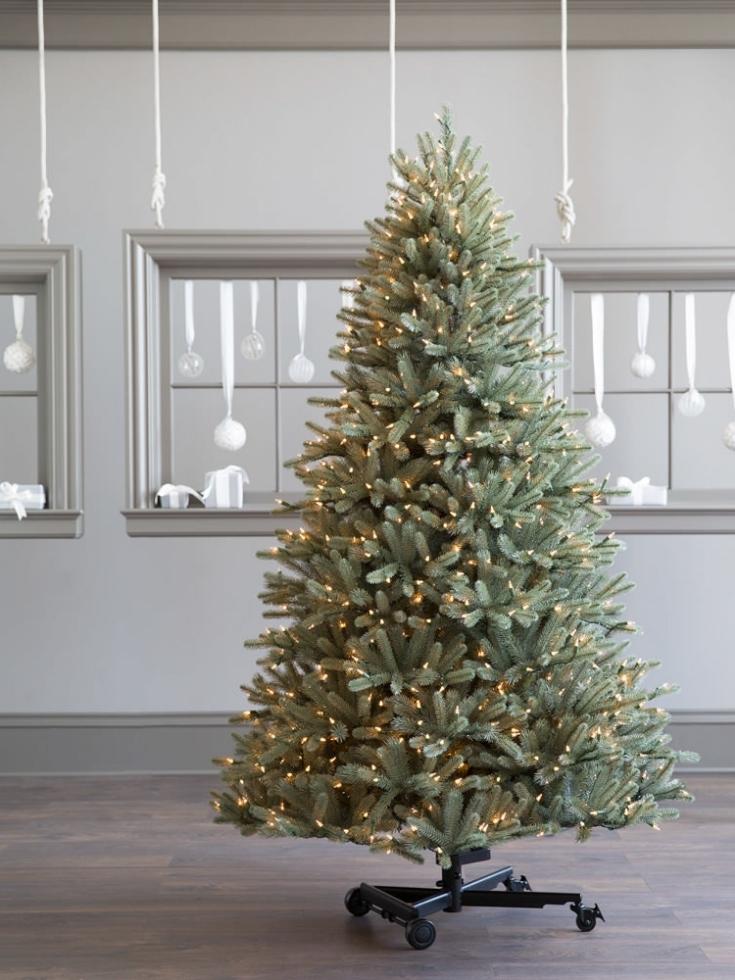 A BH Blue Spruce Flip Tree with rolling stand